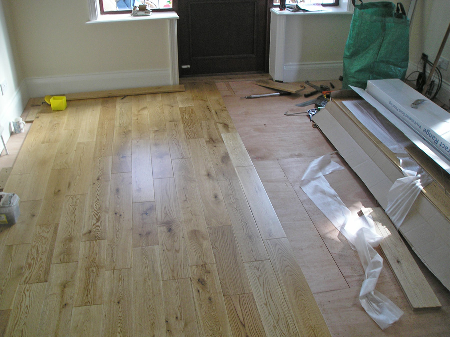 Supply & fit Oak pre finished solid 18mm strip Hardwood flooring in